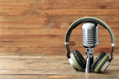 mic, headset on wood desk